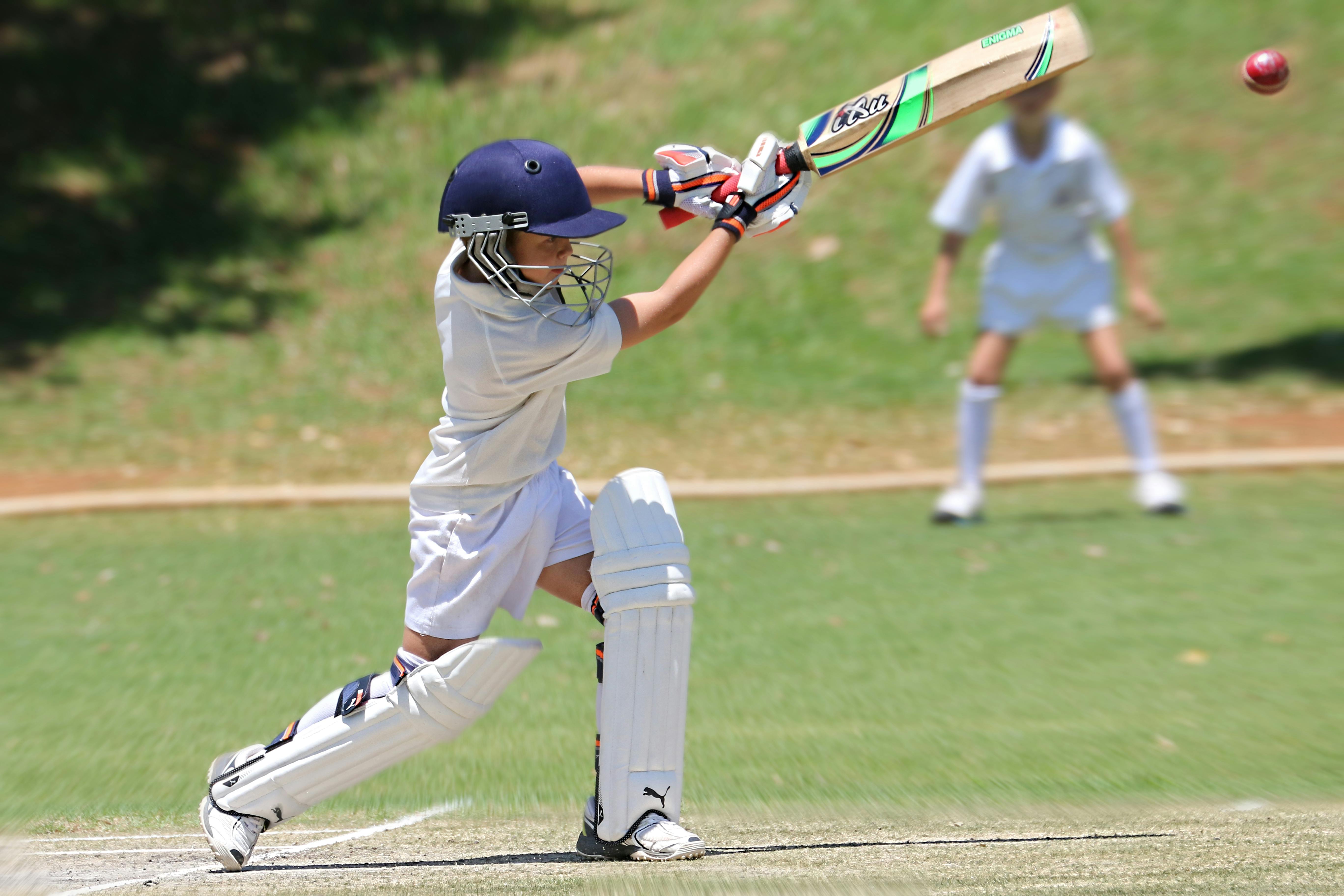 Junior playing cricket
